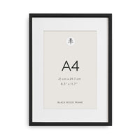 Little Otja black wooden picture frame A4 with cream mat