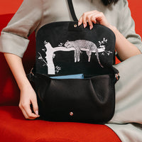 Keecie Lazy Boy leather crossbody bag in black