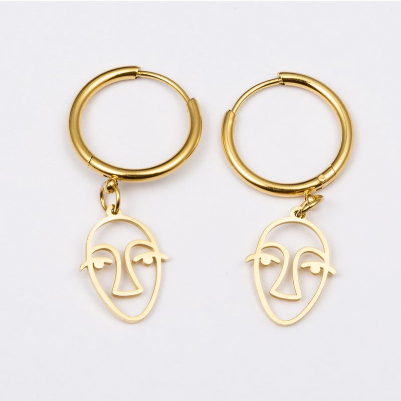 Laudeen | WAUW | Earrings stainless steel - Gold - Face charm